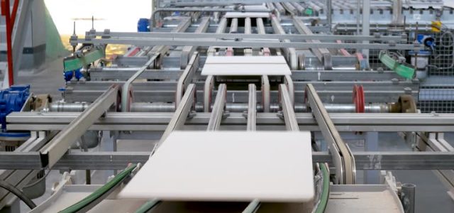 tiles Production factory line of ceramic tiles. Conveyor belt system. Modern heavy plant